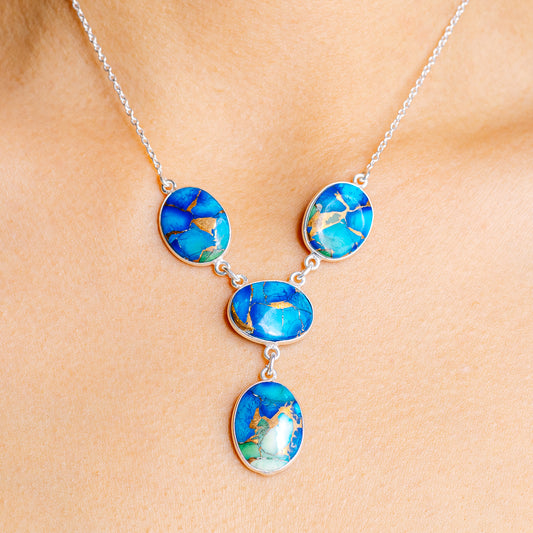 Oval turquoise resin pendant necklace with four blue-green stones and .925 silver chain