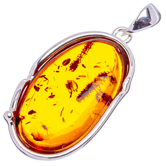 Oval Baltic amber pendant in .925 sterling silver bezel with bail loop