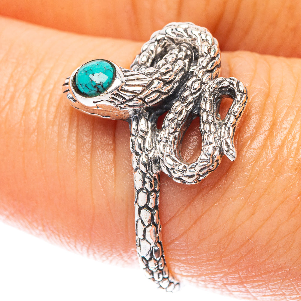 Turquoise snake motif sterling silver ring with oval turquoise cabochon