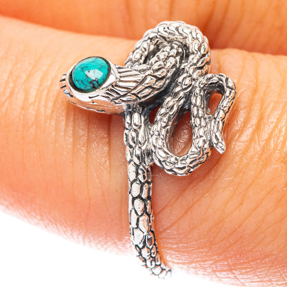 Turquoise snake motif sterling silver ring with oval turquoise cabochon