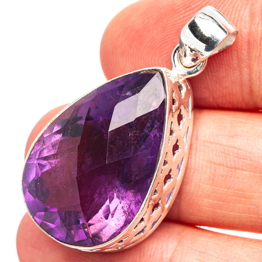 Faceted amethyst teardrop pendant in .925 sterling silver with openwork bail