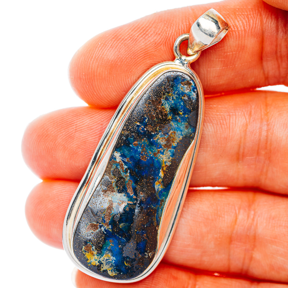 925 sterling silver teardrop pendant with blue-green boulder opal in bezel