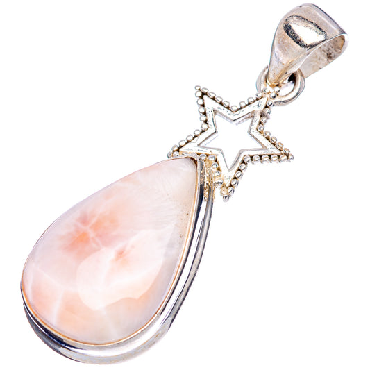 Sterling silver star pendant with pink teardrop gemstone, openwork star detail