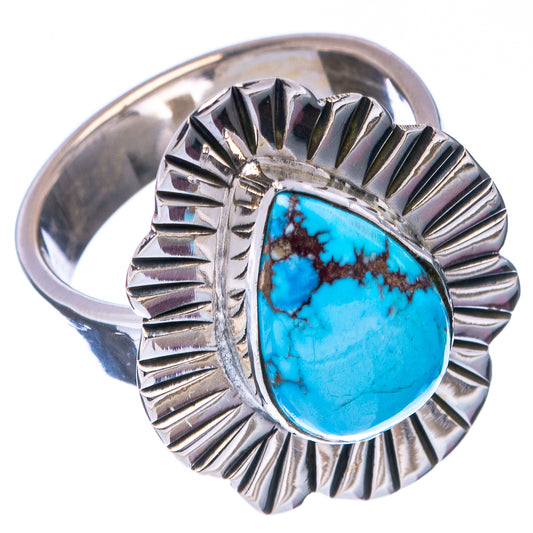 Sterling silver adjustable ring featuring blue turquoise teardrop cabochon and sunburst bezel