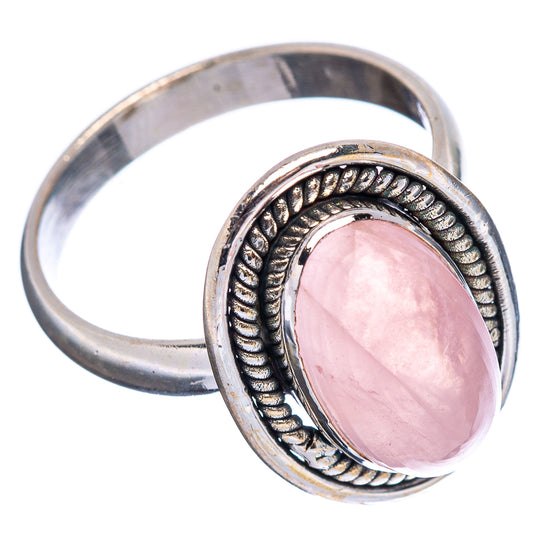 Sterling silver oval rose quartz ring with rope bezel detail, side view