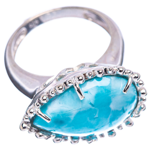 Sterling silver larimar ring side view, oval blue stone in prong-set halo on band