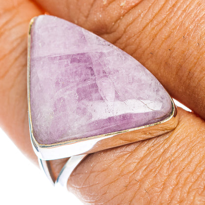 Triangular kunzite gemstone set in .925 sterling silver ring, close-up on finger