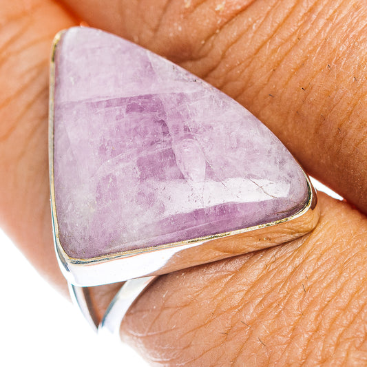 Triangular kunzite gemstone set in .925 sterling silver ring, close-up on finger