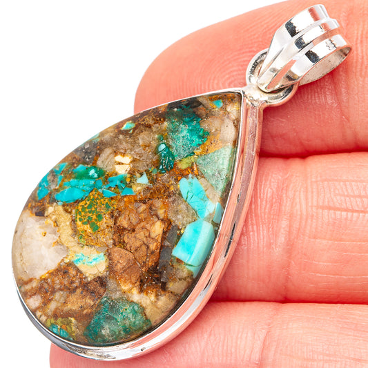 Turquoise spiny oyster teardrop pendant in .925 sterling silver setting