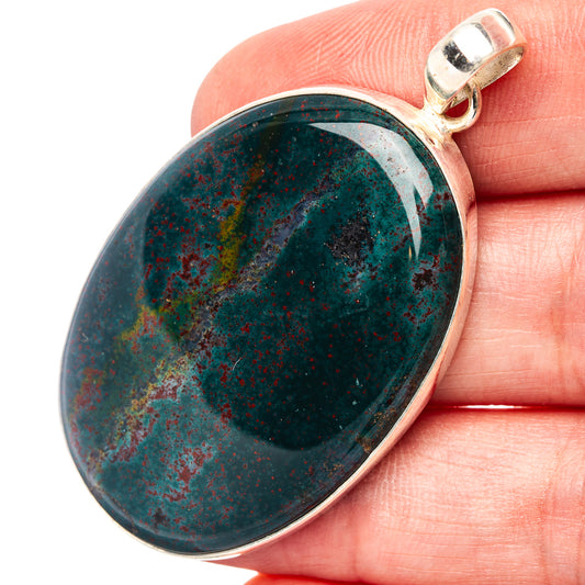 Oval bloodstone pendant in sterling silver bezel, dark green with red speckles
