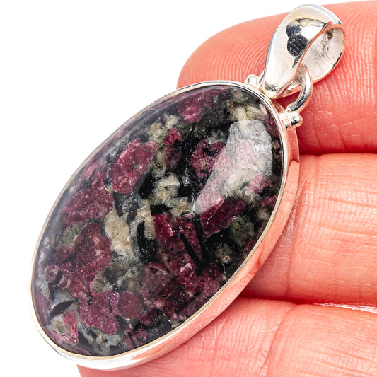 Sterling silver eudialyte pendant, oval stone with purple and black crystal pattern