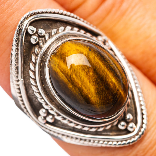Tiger's eye ring, .925 sterling silver, oval cabochon in ornate close-up bezel