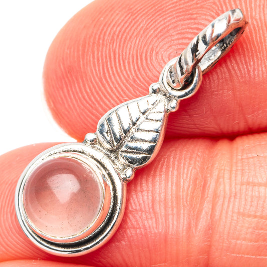 Rose quartz pendant in .925 sterling silver, round pink stone with ornate bail