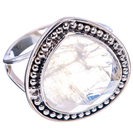 Sterling silver oval moonstone ring viewed from side, beaded bezel and iridescent center