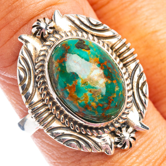 Sterling silver turquoise oval ring with ornate engraved shoulders; size 8.75