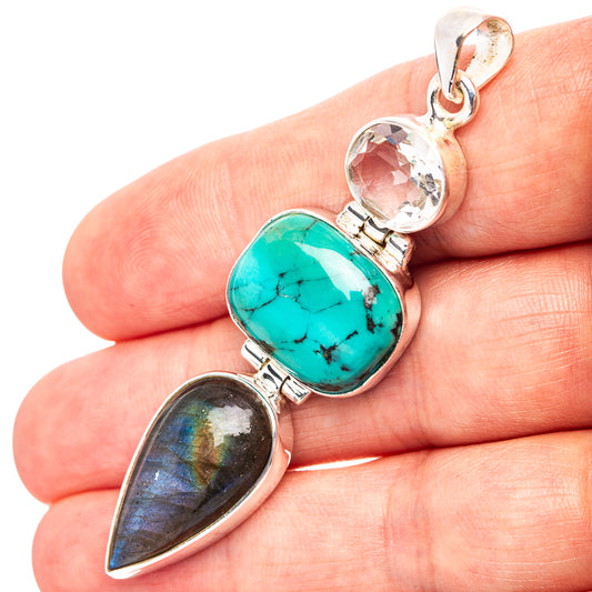 Sterling silver pendant with turquoise oval and blue labradorite teardrop stones