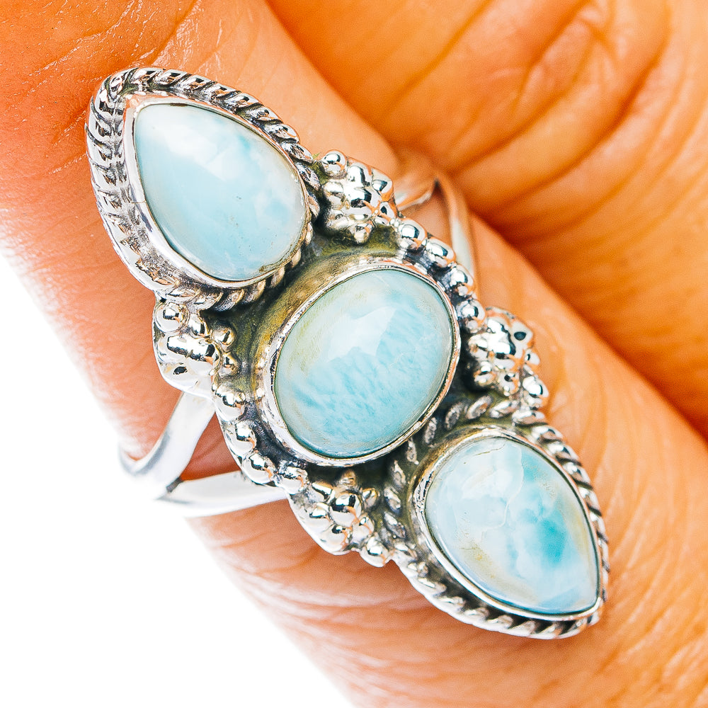 Sterling silver larimar ring with three oval light-blue stones in ornate bezel
