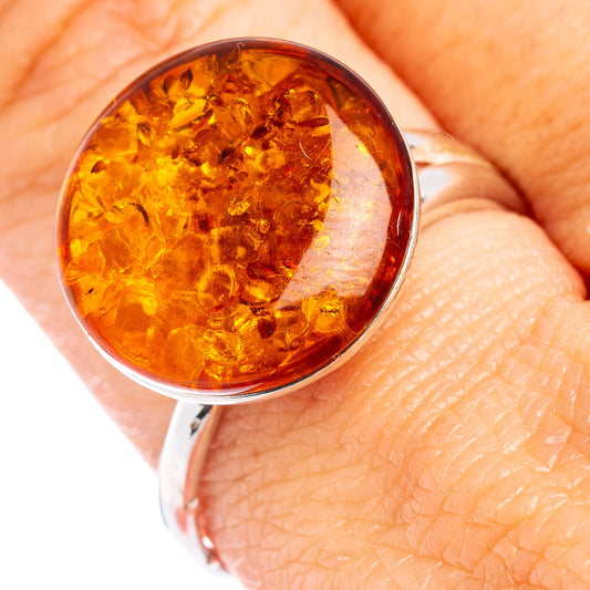 Amber cabochon sterling silver adjustable ring with round Baltic Amber centerpiece