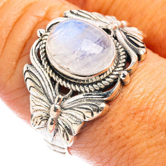Sterling silver butterfly ring with oval rainbow moonstone cabochon, detailed band