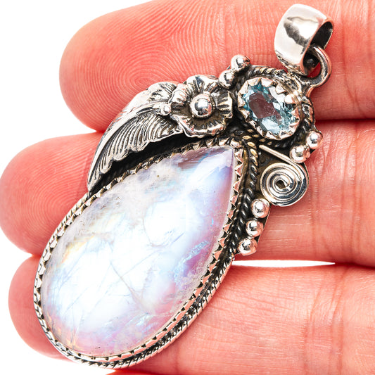 Sterling silver moonstone pendant, teardrop rainbow moonstone with blue center and wing detail