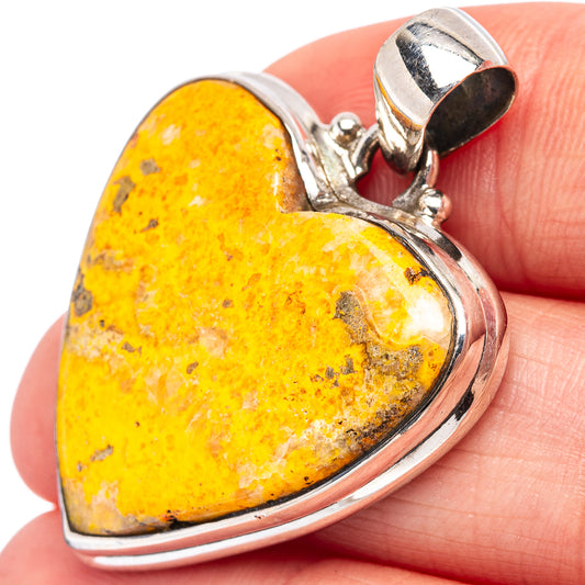 Heart-shaped jasper pendant in .925 sterling silver with yellow stone bezel