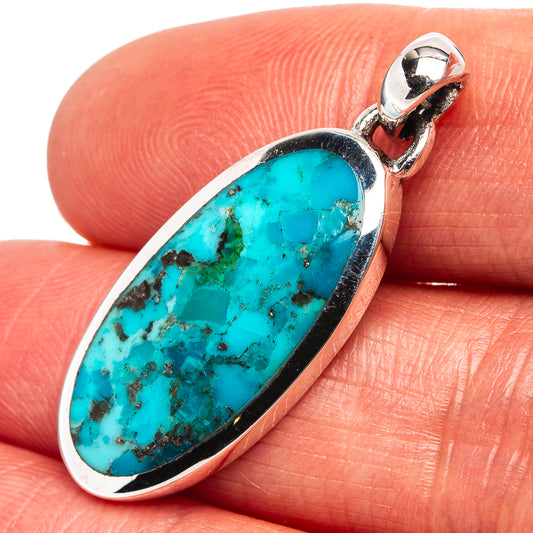Turquoise oval pendant with sterling silver bezel and bail, natural stone matrix.