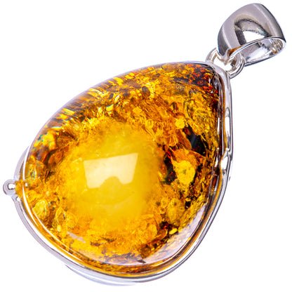 Teardrop amber resin pendant in silver with shiny bail, golden tones