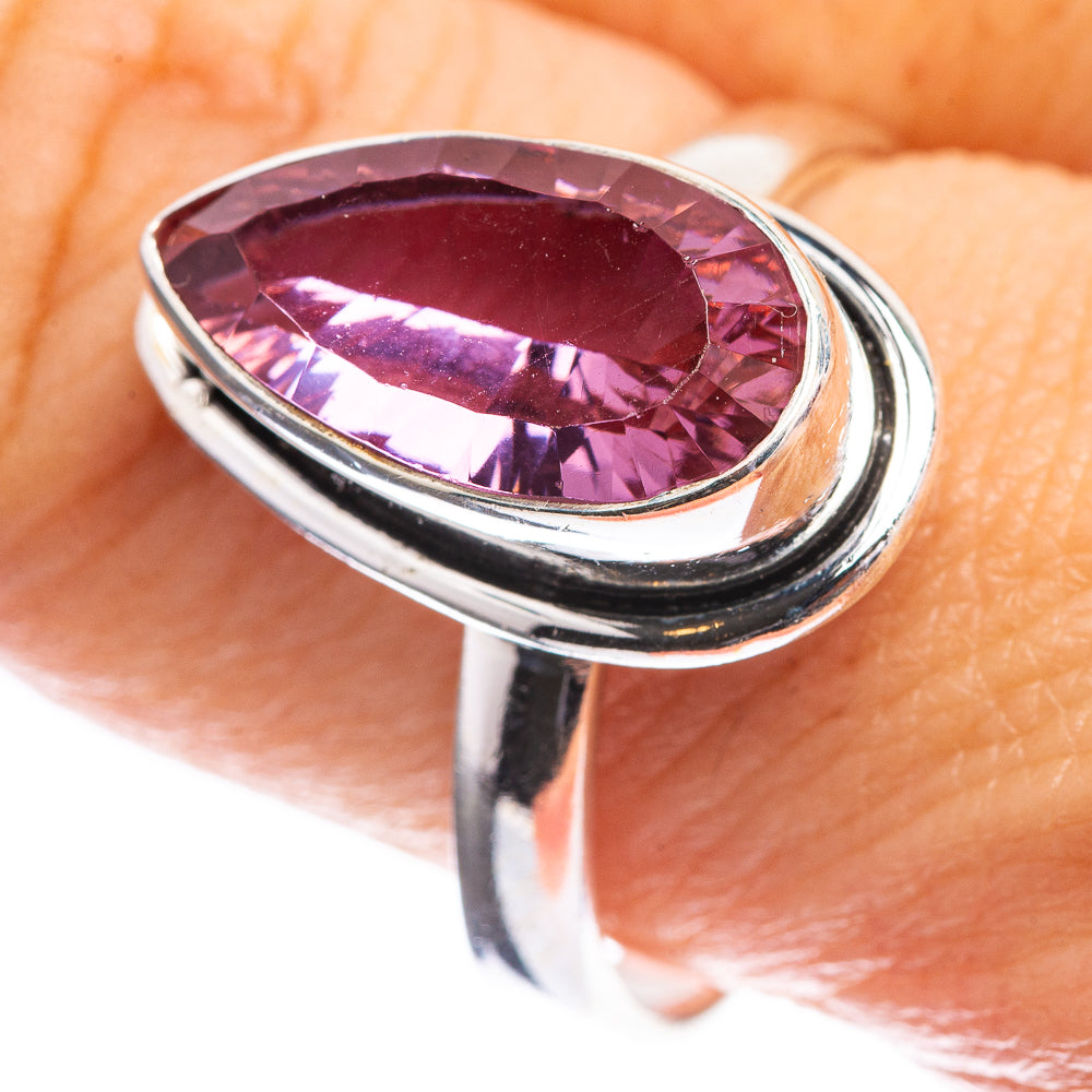 Sterling silver oval faceted color-change ring with purple gemstone, split shank