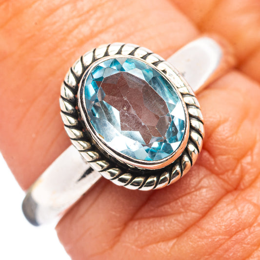 Blue topaz oval ring in .925 sterling silver, rope bezel, size 6.5