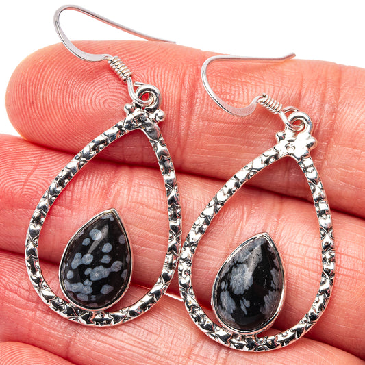 Teardrop sterling silver earrings with bezel-set speckled black obsidian stones