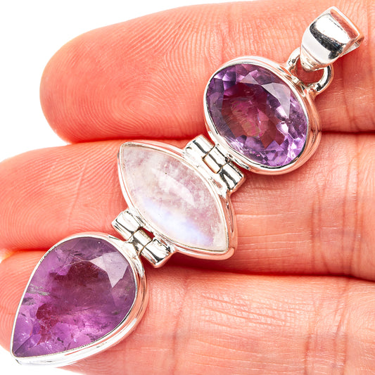Sterling silver three-stone pendant with purple amethyst and pale moonstone ovals
