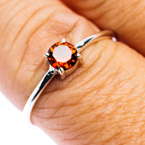 Garnet stackable ring, .925 sterling silver, size 9.5, round orange-red stone