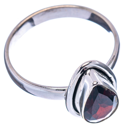 Sterling silver garnet ring, oval faceted dark-red gemstone in raised split setting