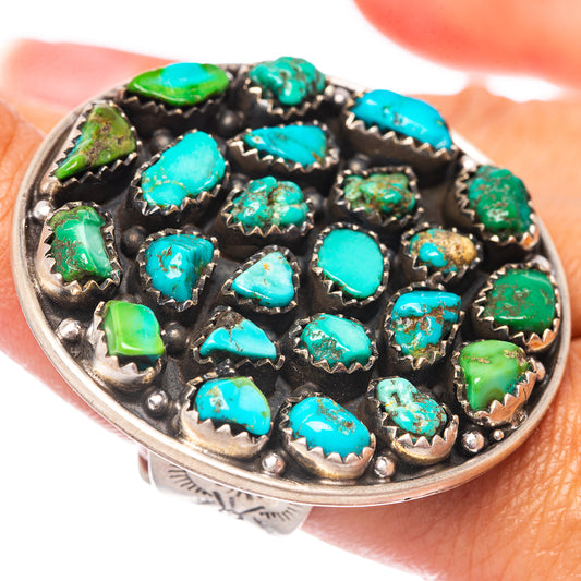 Adjustable turquoise gemstone ring, close-up of bezel-set stones on silver band