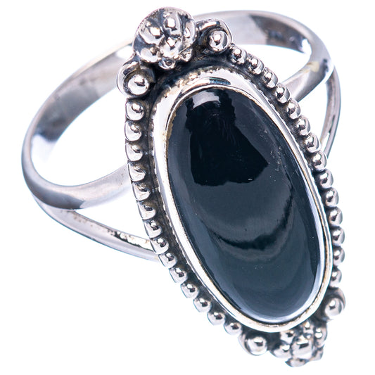 Sterling silver ring featuring oval black onyx bezel and decorative beadwork border