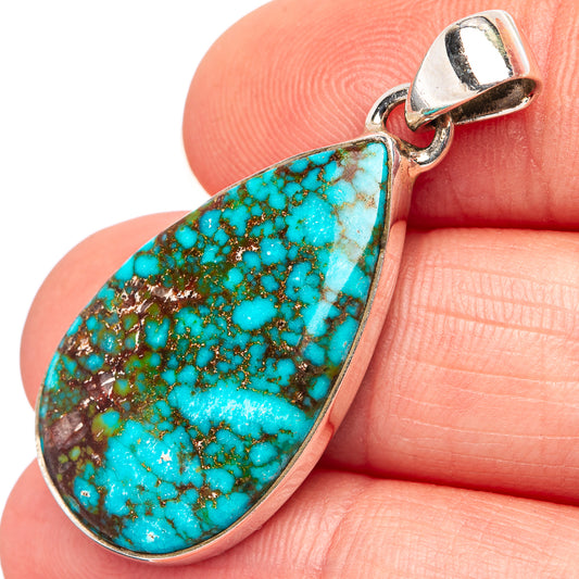 Turquoise teardrop pendant detail in .925 sterling silver, marbled stone pattern