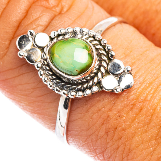Sterling silver dainty ring with oval green turquoise cabochon and beaded border