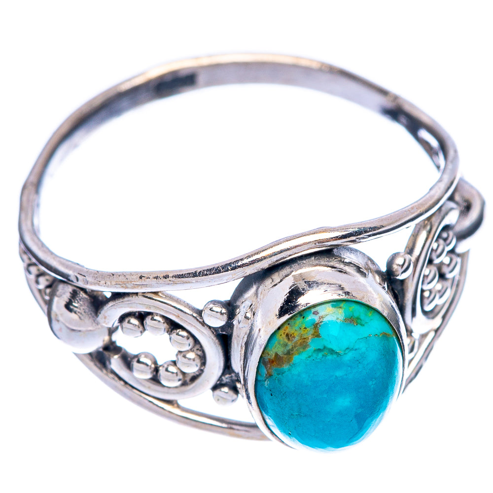 Silver ring with turquoise cabochon, engraved side filigree and openwork details