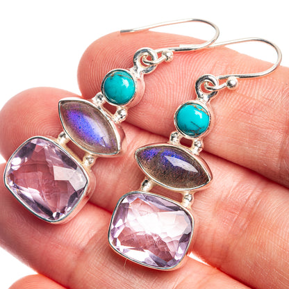 Sterling silver drop earrings with turquoise round cabochons and pink-purple faceted stones