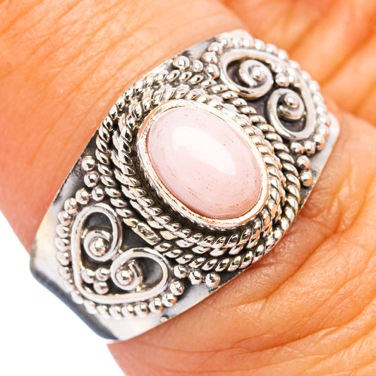 Sterling silver ring with pink oval opal and ornate filigree, size 6.75