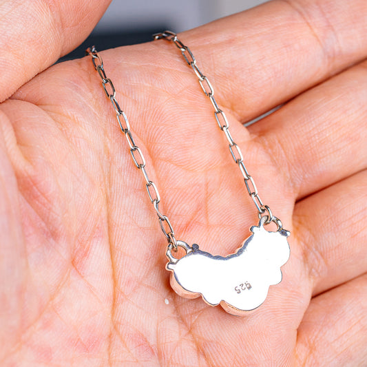 Sterling silver chain turquoise pendant necklace with scalloped pendant back, clasp visible