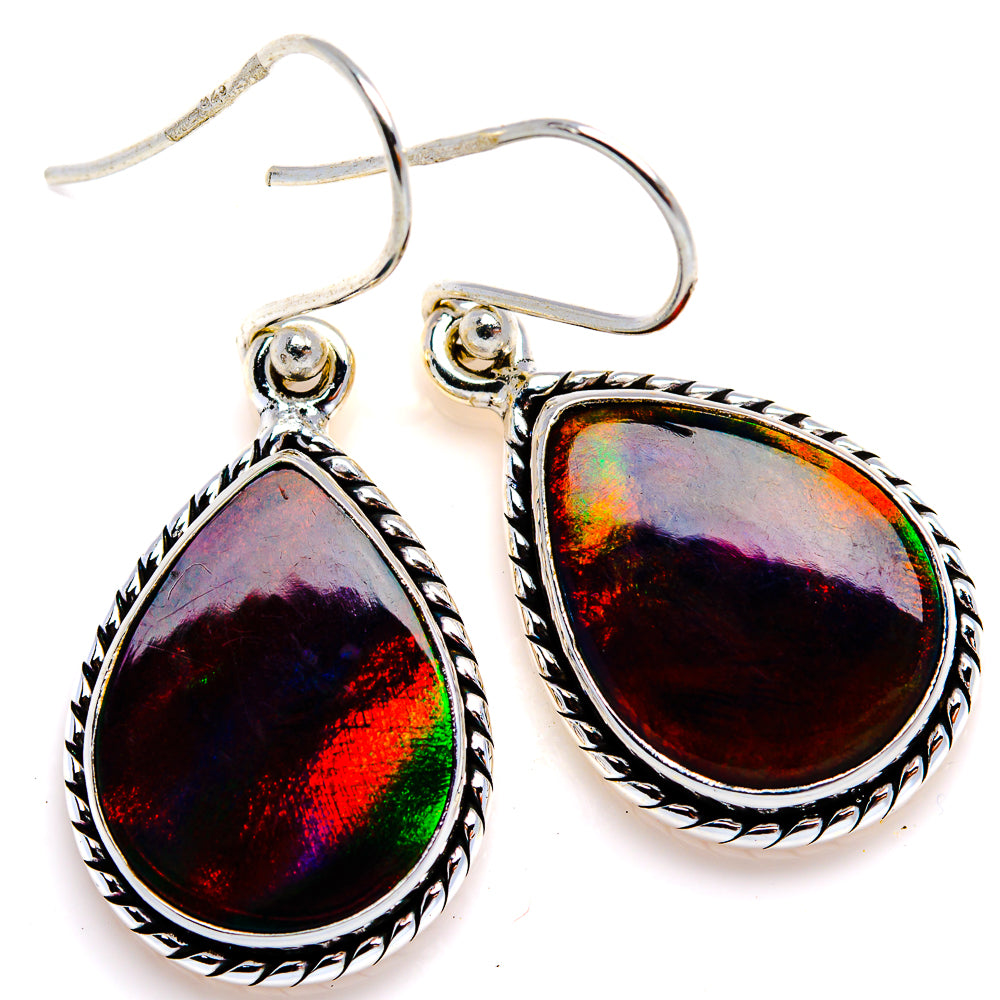 Sterling silver opal teardrop earrings with rainbow iridescent stones and ornate border