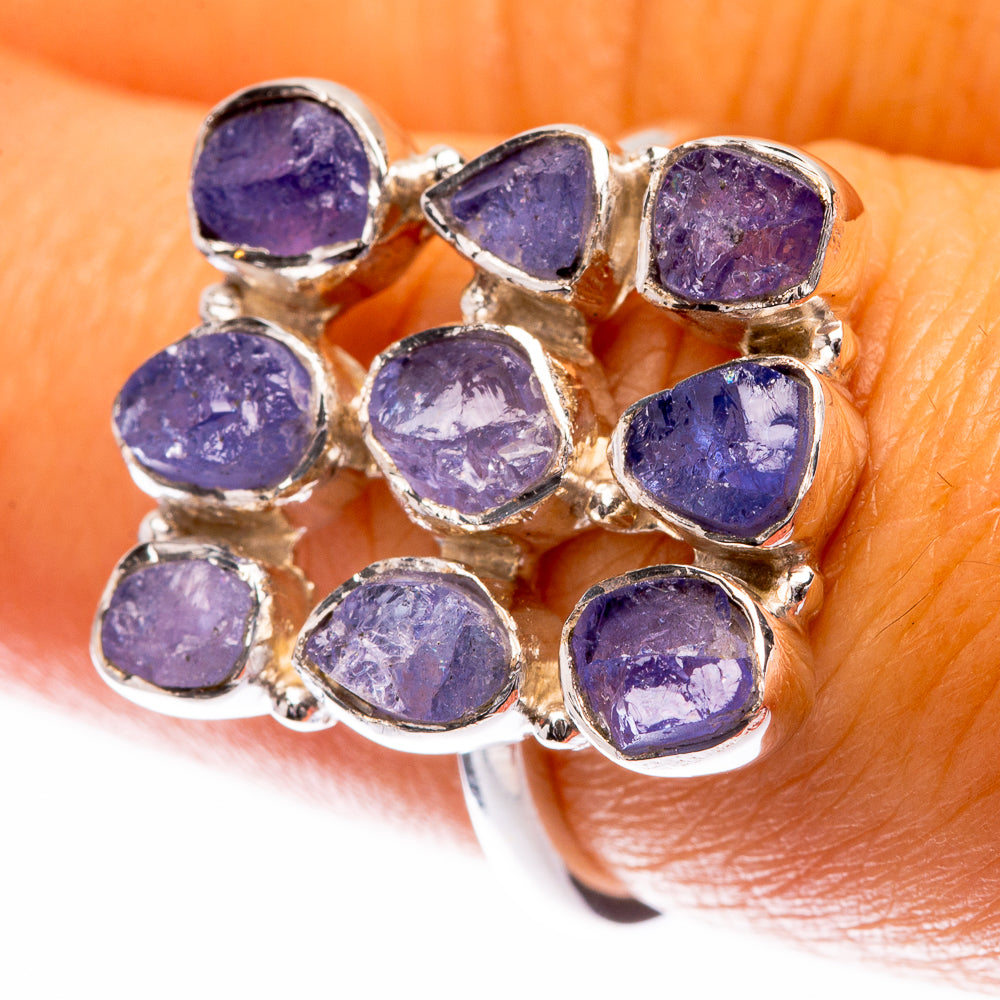 Sterling silver tanzanite ring with nine oval blue-purple gemstone settings