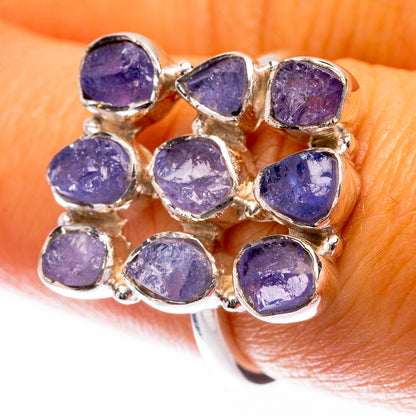 Sterling silver tanzanite ring with nine oval blue-purple gemstone settings