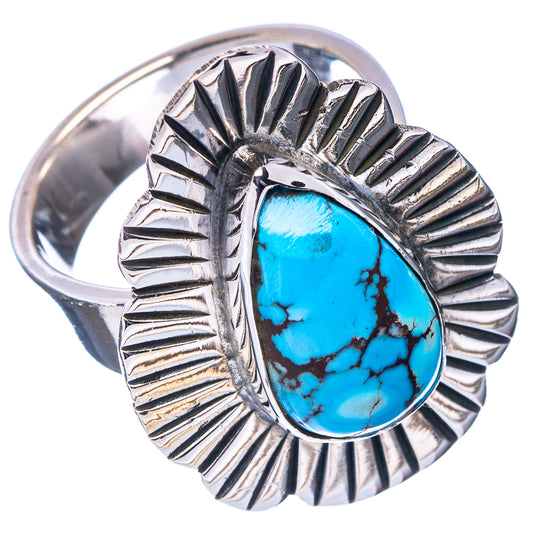 Sterling silver ring with blue turquoise teardrop stone and ridged sunburst setting