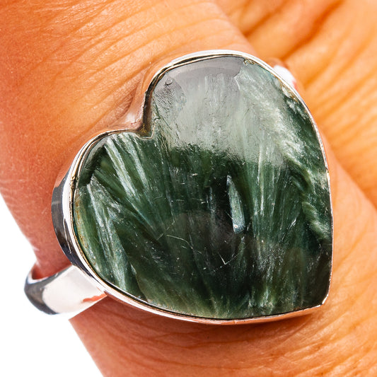 Heart-shaped green stone ring in .925 sterling silver bezel setting