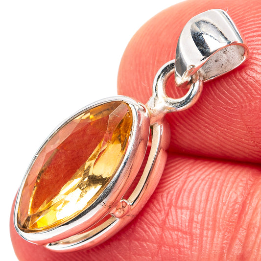 Sterling silver pendant with faceted oval citrine gemstone and hinged bail