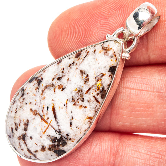 Astrophyllite pendant, teardrop white gemstone with dark speckles, .925 silver bail