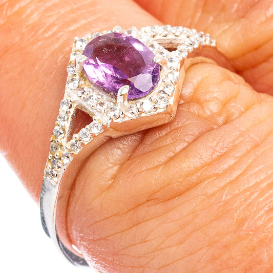 Amethyst and cubic zirconia sterling silver ring with oval purple stone and halo
