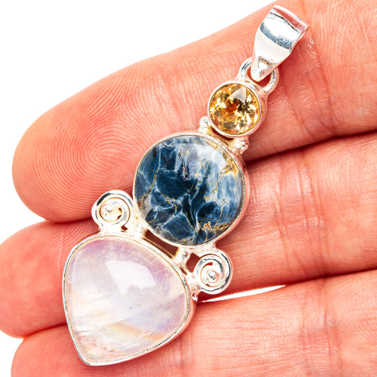 Sterling silver gemstone pendant with yellow citrine, blue petersite, and white moonstone